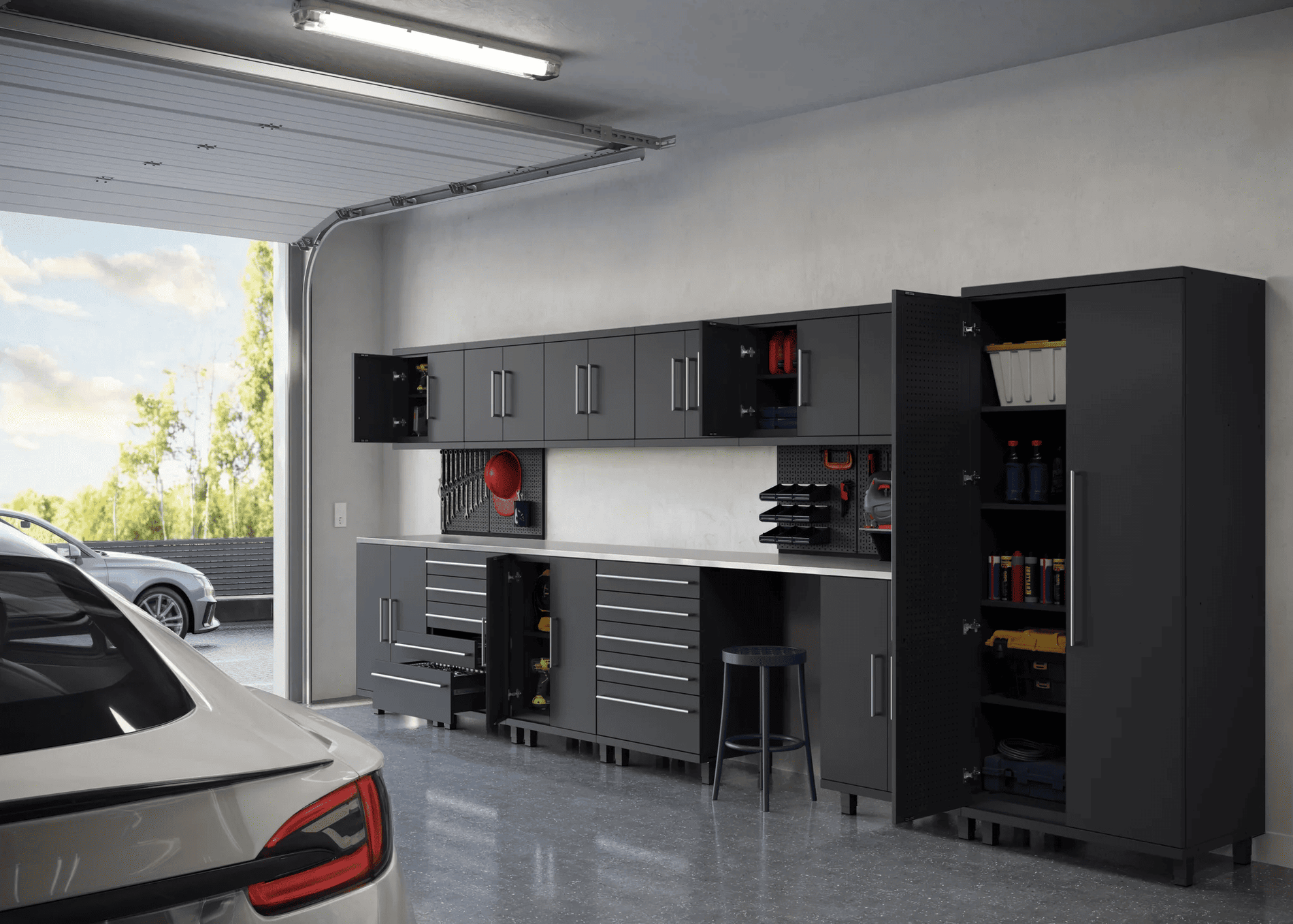 Prestige Series metal garage cabinet system in a modern organized garage